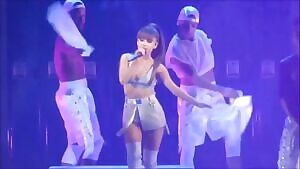 Spreading her legs open