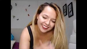 She blows a kiss and reveals the tits.