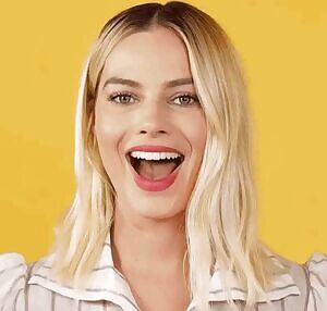 Margot Robbie being introduced to a Black man