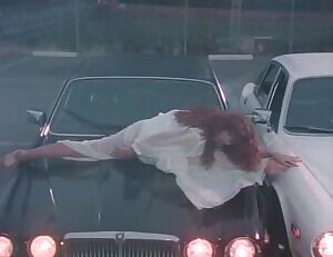 Tawny Kitaen in the Whitesnake music video