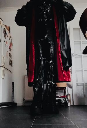 I love wearing my latex top & corset under my big coat