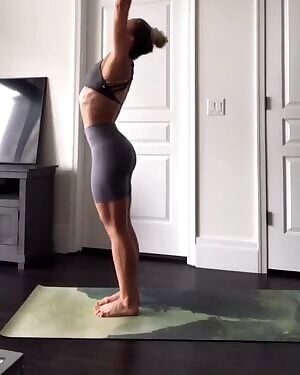 Sarah Houchens does yoga stretches