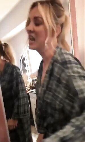 Kaley Cuoco almost popping out of her robe