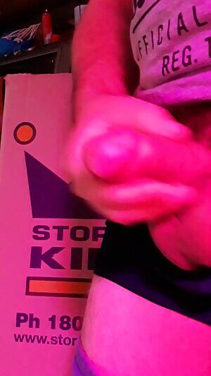 Erect circumcised throbbing cock