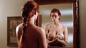 A geeky-looking Monique Gabrielle trying time turn herself on in Evil Toons