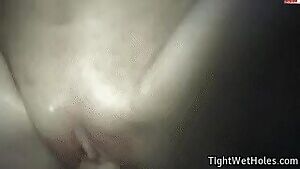 Over her blue top outdoors