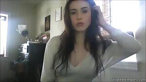 Cute brunette flashes her pierced nipples