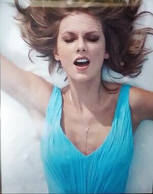 Taylor Swift enjoying the splash as she takes it willingly