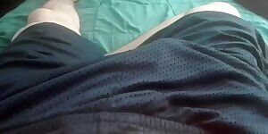 I make my throbbing bulge wiggle under my shorts