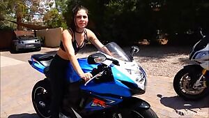 Somara on a gsxr in front of golf course