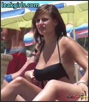 busty mom takes off her top