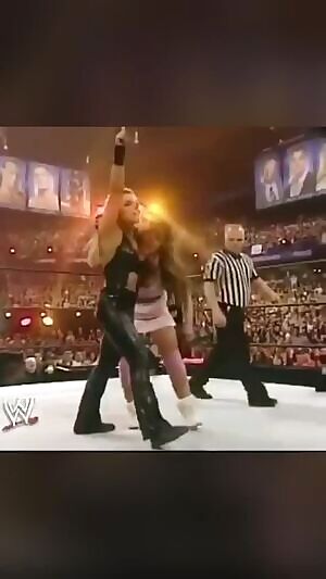 Mickie taking what she wants from Trish