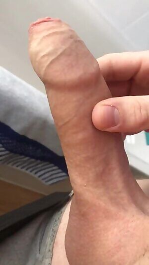 Slowly pulling back my foreskin