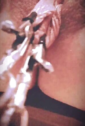 Long meaty labia stretched with weights