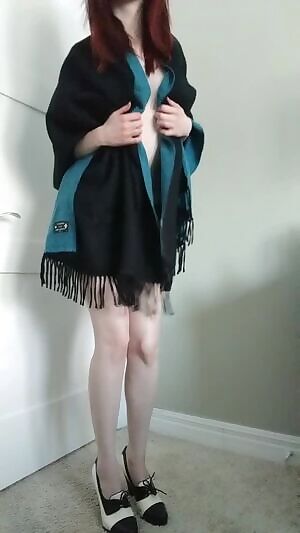 This scarf could almost pass as clothes! Until the titty reveal, at least.