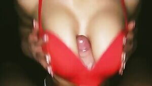 big tits wrapped around a big dick stuffed in a bra