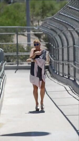 Milf flashing next to a freeway