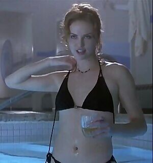 Charlize Theron topless in pool