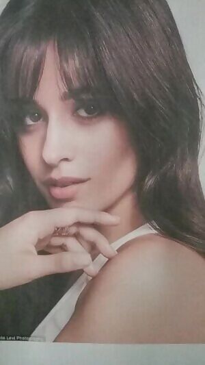 Camila Cabello taking a load to the face