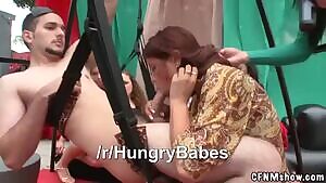 Two rings showing as a hungry babe eats in front of her hungry friends