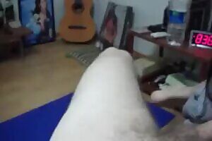 Her long white lollipop makes he very happy.