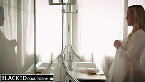 Admiring herself in the mirror