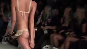 Bikini model has a spring in her step