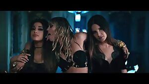 Miley Cyrus being Miley Cyrus in a new music video with Ariana Grande and Lana Del Rey