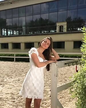 Really short video in a white dress