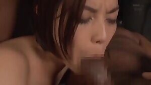 Saryu Usui takes it from behind while having a mouthful of cock