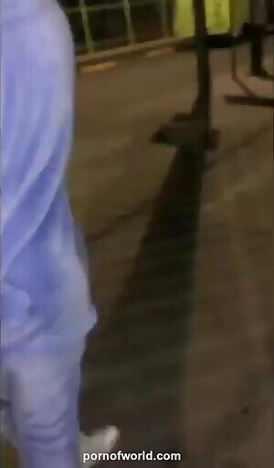 Bunny with a bare ass jumping on a night street