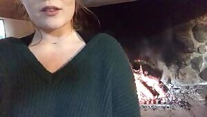 boobs out near the fireplace!