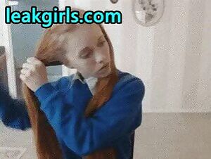 Dolly Little does her pigtails