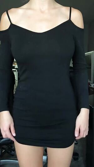 My titty drop in a little black dress