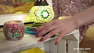 Lisa and Sam play with a dildo.