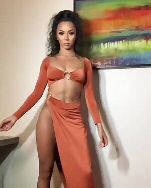 Brittany Renner in a sexy dress