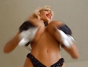 90s bimbo Pandora Peaks whipping off her oversized bra