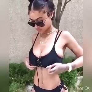 Who is this big tit bikini girl??