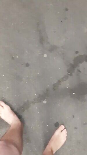 Nude walk around a large street at night