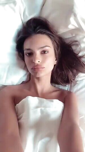 Emily Ratajkowski on her back