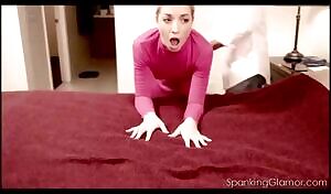 Girl gets spanked in a short pink dress