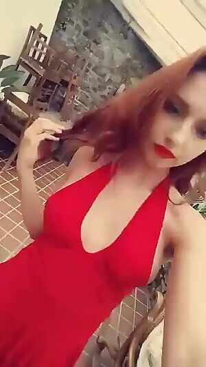 Redhead in red dress