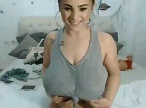 Shaking her huge tits