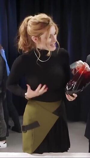 Bella Thorne pressing her tits in public
