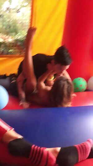 Pornstar Nikki Hearts Making Out and Fingering Girl In Bouncy Castle