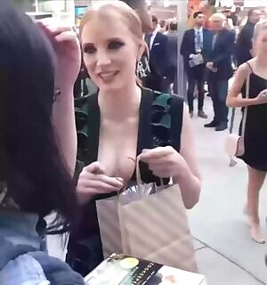 Jessica Chastain pressing her fat tits with that pen is so fucking hot