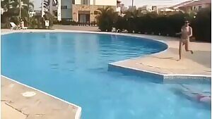 Trying to jump across the swimming pool