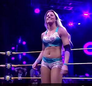 Candice LeRae's adorable face/great body always get me hard
