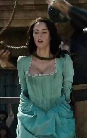 A Helpless Kaya Scodelario whoring herself out to the the townsmen to spare her. She'd be put in a pillory on the same stage and used like the slut she is and becomes the town's whore