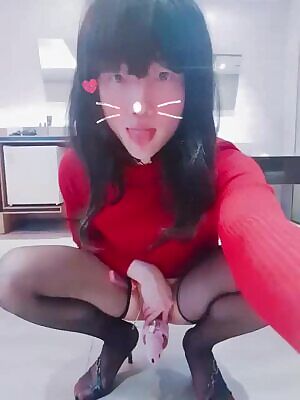 Asian sissy locked up in a pink chastity